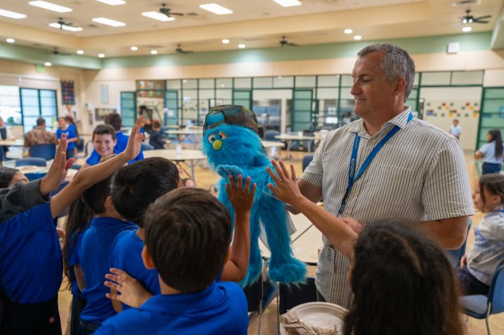 Outgoing principal inspired creativity, pilina through puppetry